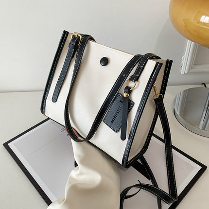 Sac messager à bandoulière tendance avec coutures tendance