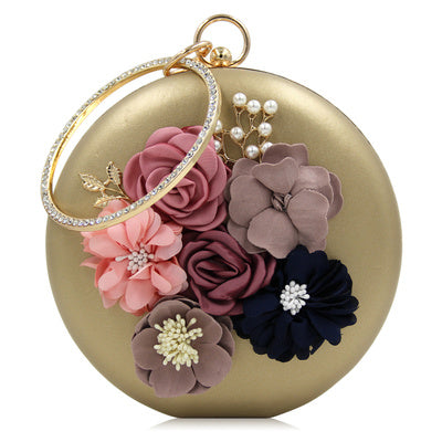 Pochette ronde élégante en cuir rouge avec motif floral