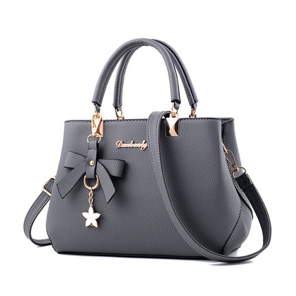 Sac à bandoulière pour femme avec nœud papillon et pendentif étoile