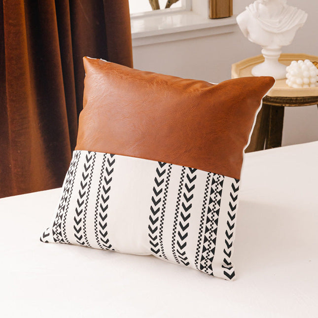 Double sofa cushion with stylish pattern and leather accent, providing comfort and elegance for living spaces.