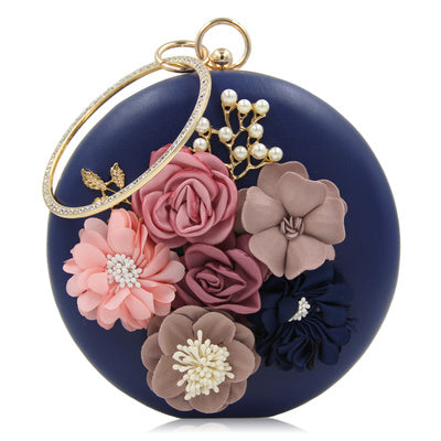 Pochette ronde élégante en cuir rouge avec motif floral