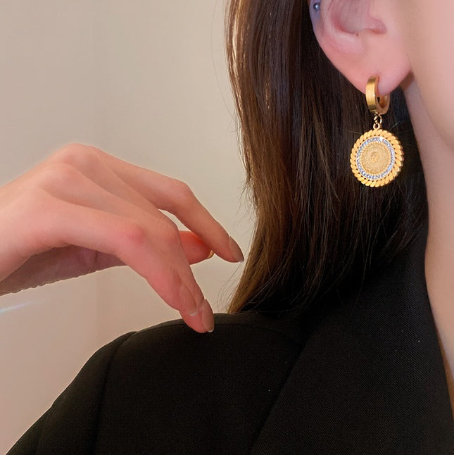 Boucles d'oreilles en acier titane et diamant