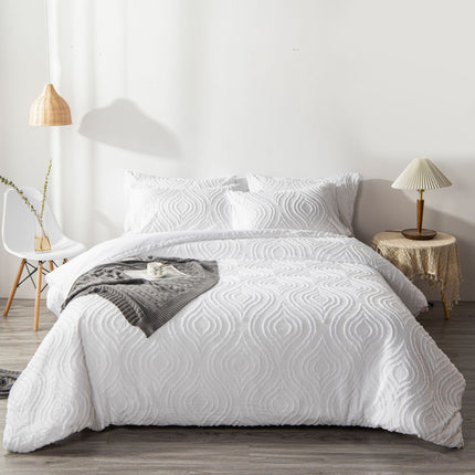 Artistic Bohemian Quilt Cover Set on a bed with intricate white patterns, enhancing bedroom décor.