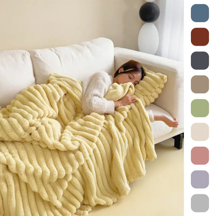 Warm Velvet Fur Blanket draped over a sofa with person relaxing, showcasing its luxurious, plush texture and elegant design.